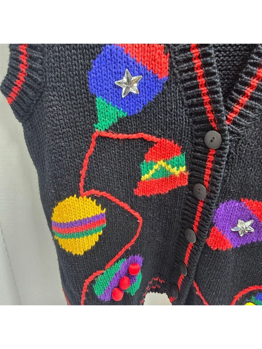 Black V-Neck Sweater with Colorful Accents